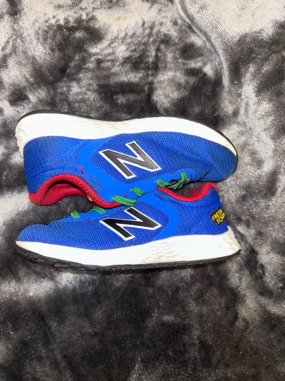 New Balance Kids Blue Sneakers with Red and Green Accents 9c